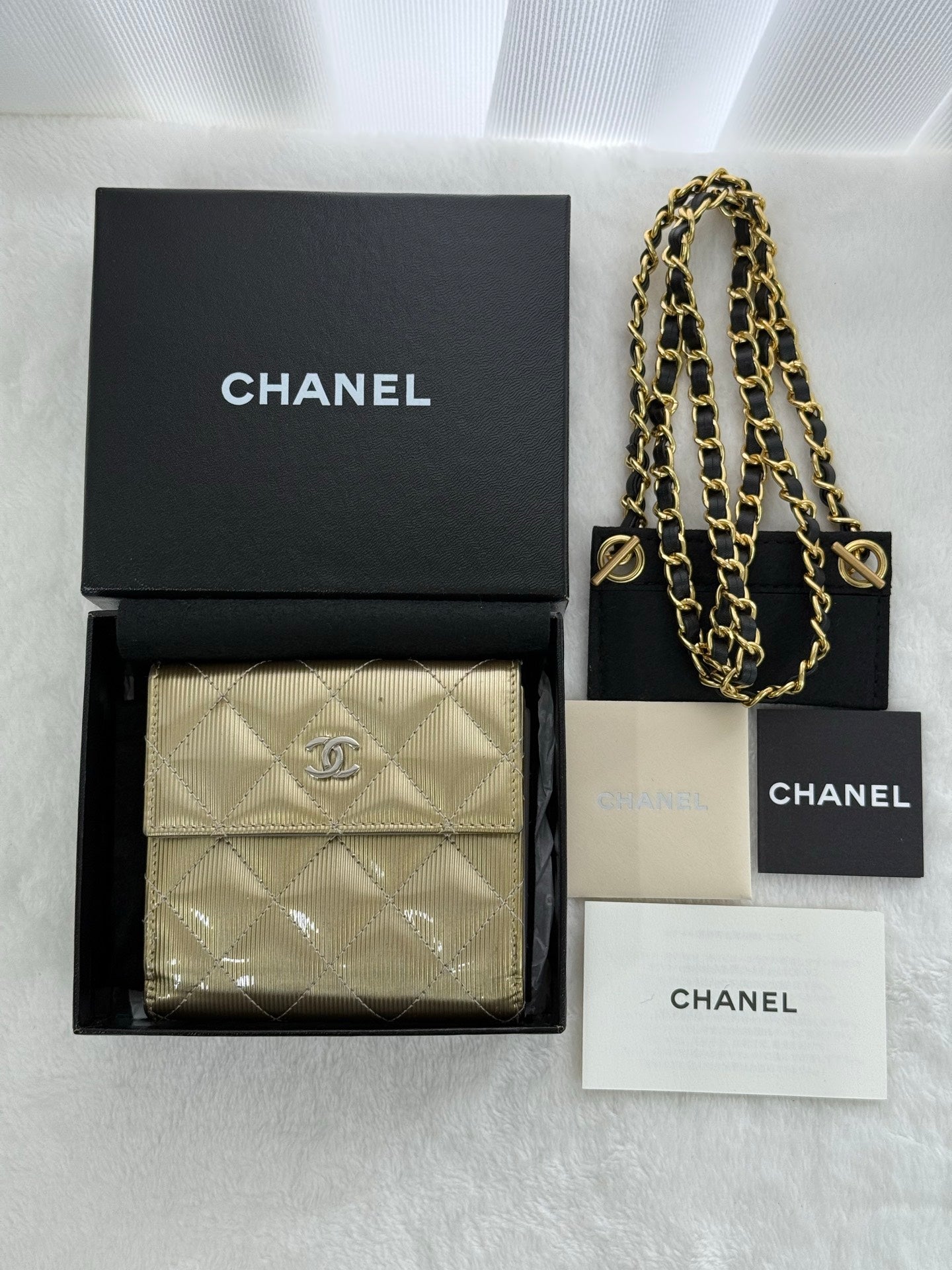 CHANEL Gold Quilted Striated Patent Leather S-Double Compact Wallet