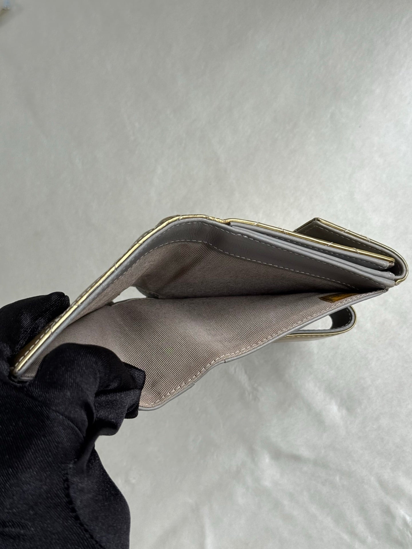 CHANEL Gold Quilted Striated Patent Leather S-Double Compact Wallet