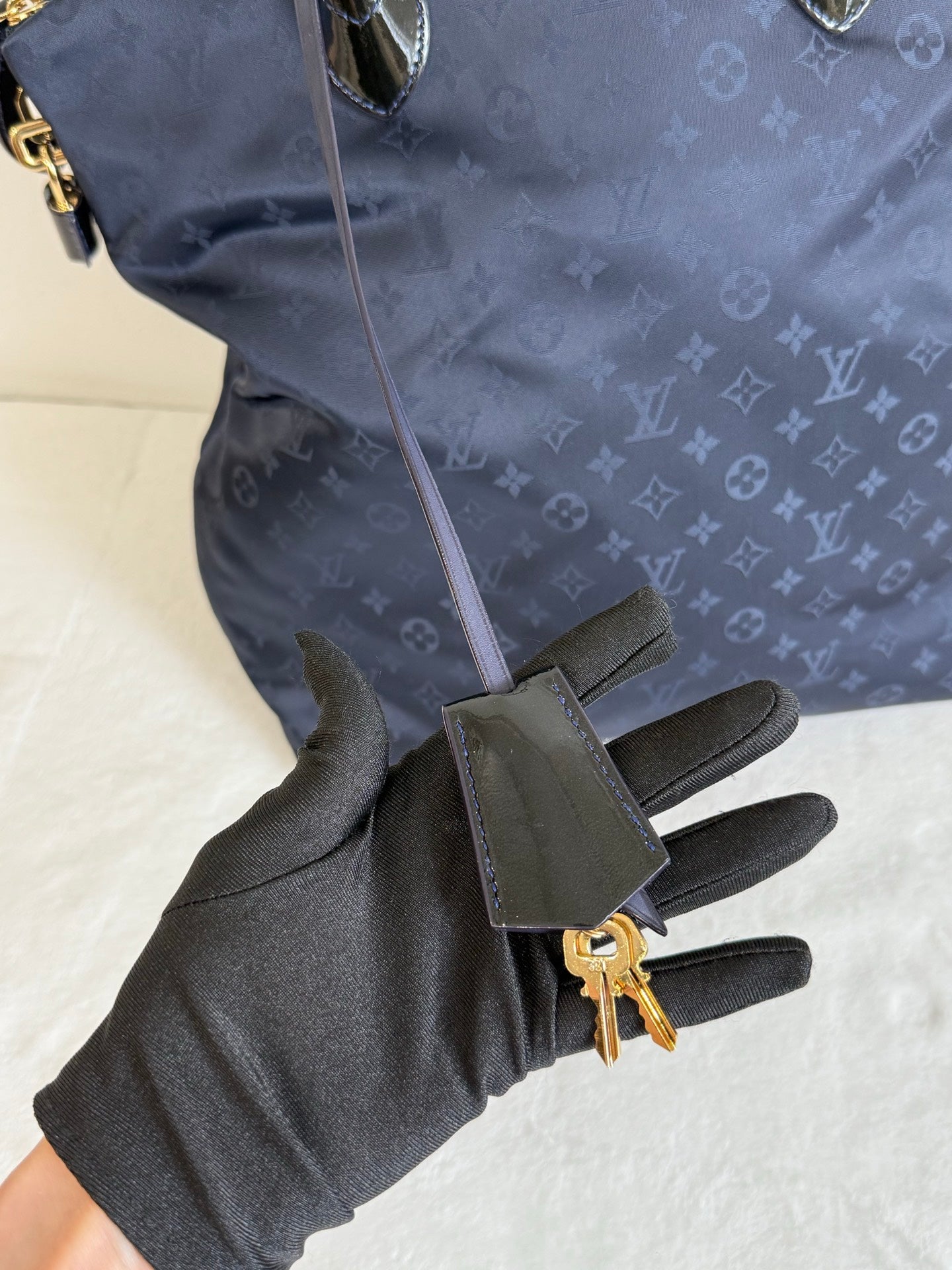 LOUIS VUITTON Blue Monogram Desire Vertical Lock it MM