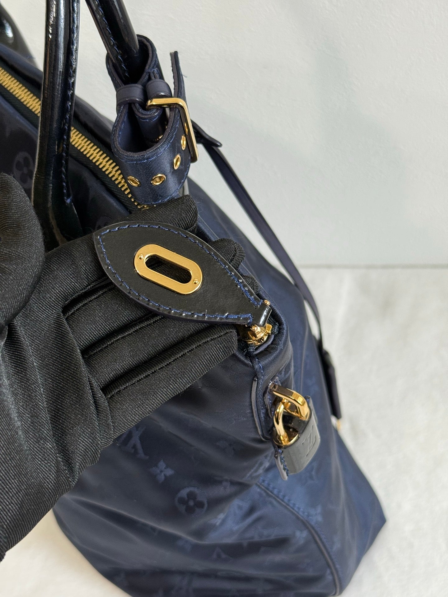 LOUIS VUITTON Blue Monogram Desire Vertical Lock it MM