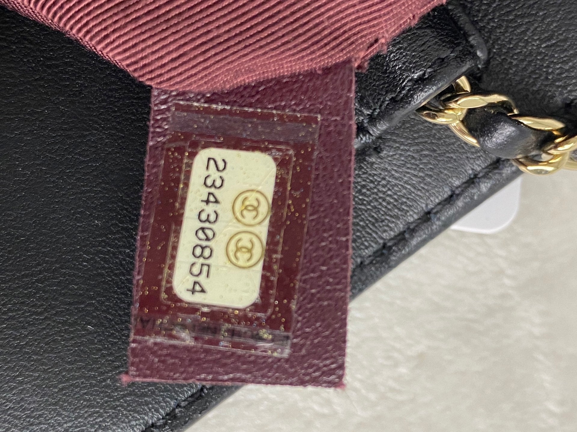 CHANEL Lambskin Enamel Logo Plate Clutch with Chain