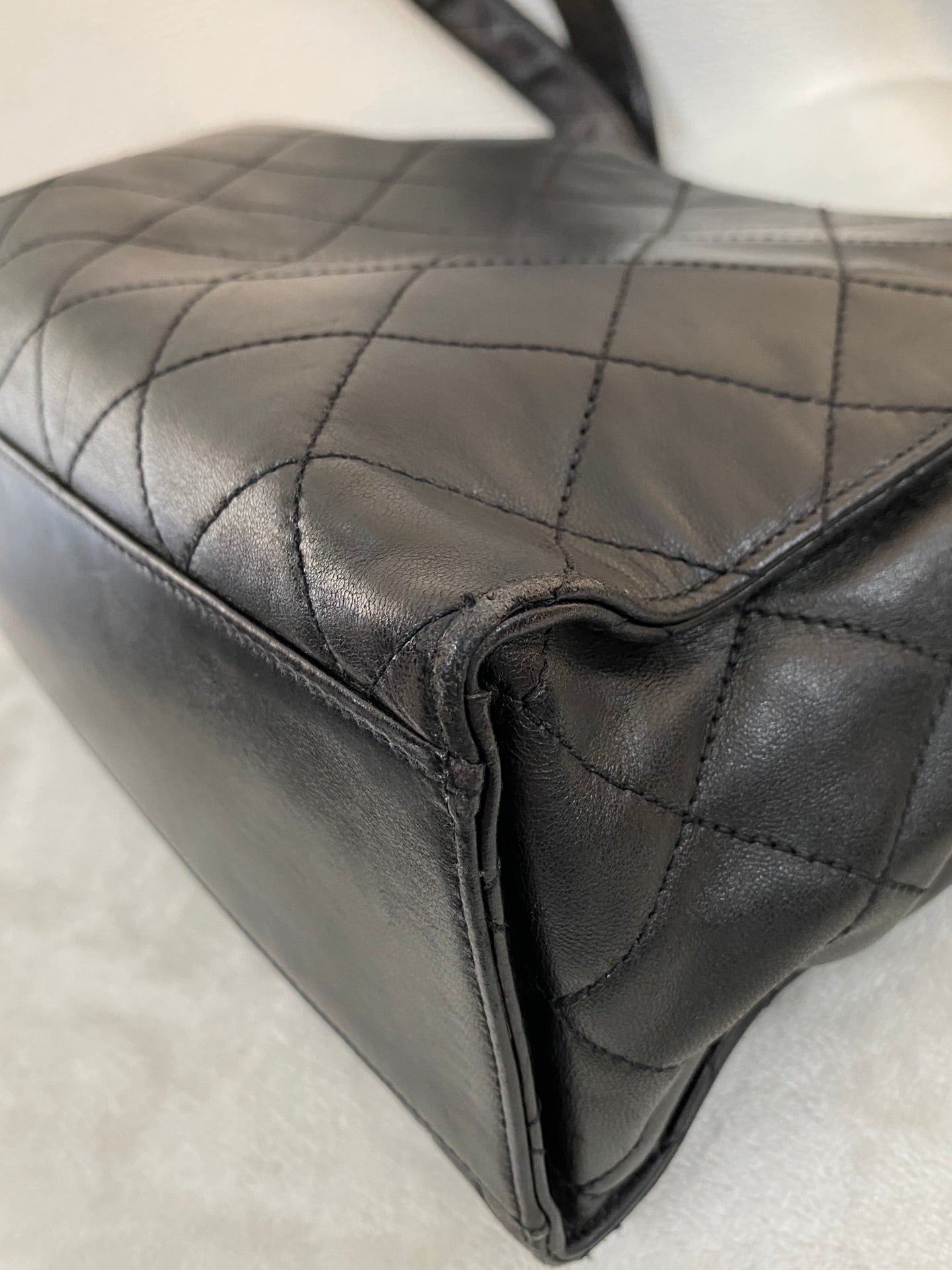 CHANEL Stitches Quilted Lambskin Handbag