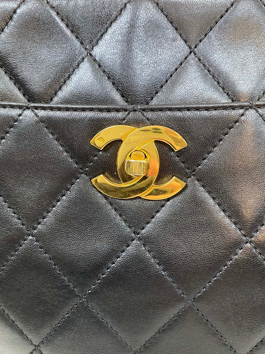 CHANEL Stitches Quilted Lambskin Handbag
