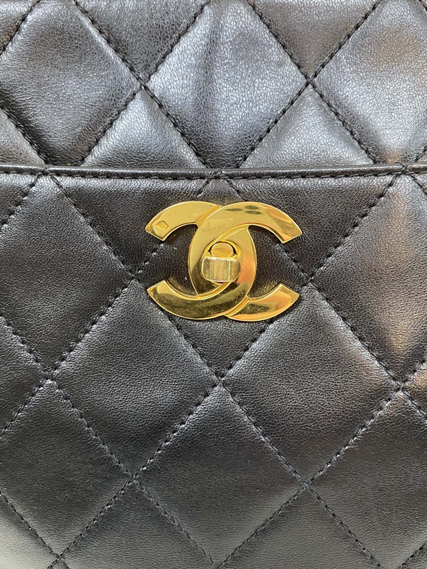 CHANEL Stitches Quilted Lambskin Handbag