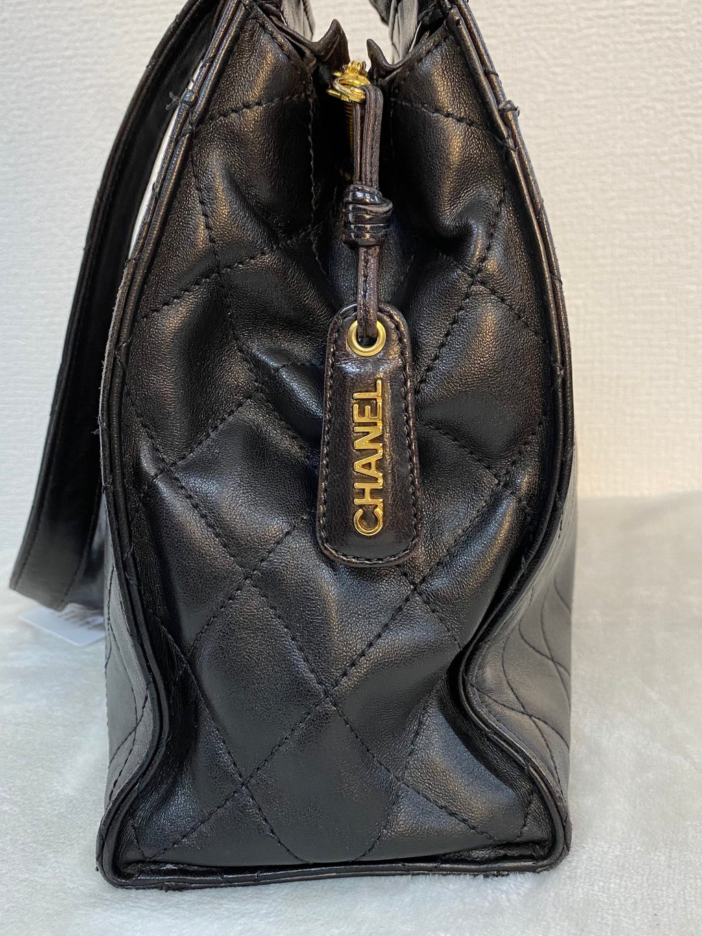 CHANEL Stitches Quilted Lambskin Handbag