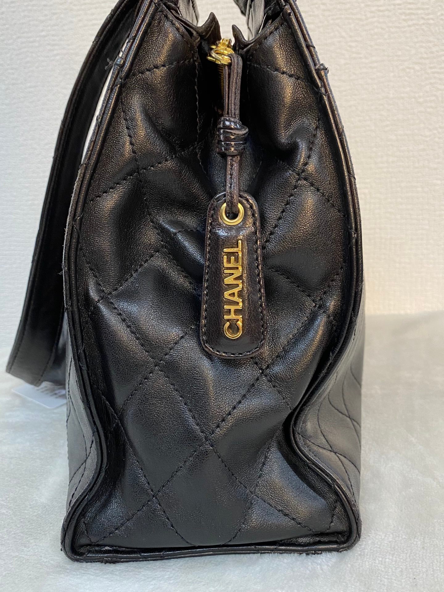 CHANEL Stitches Quilted Lambskin Handbag