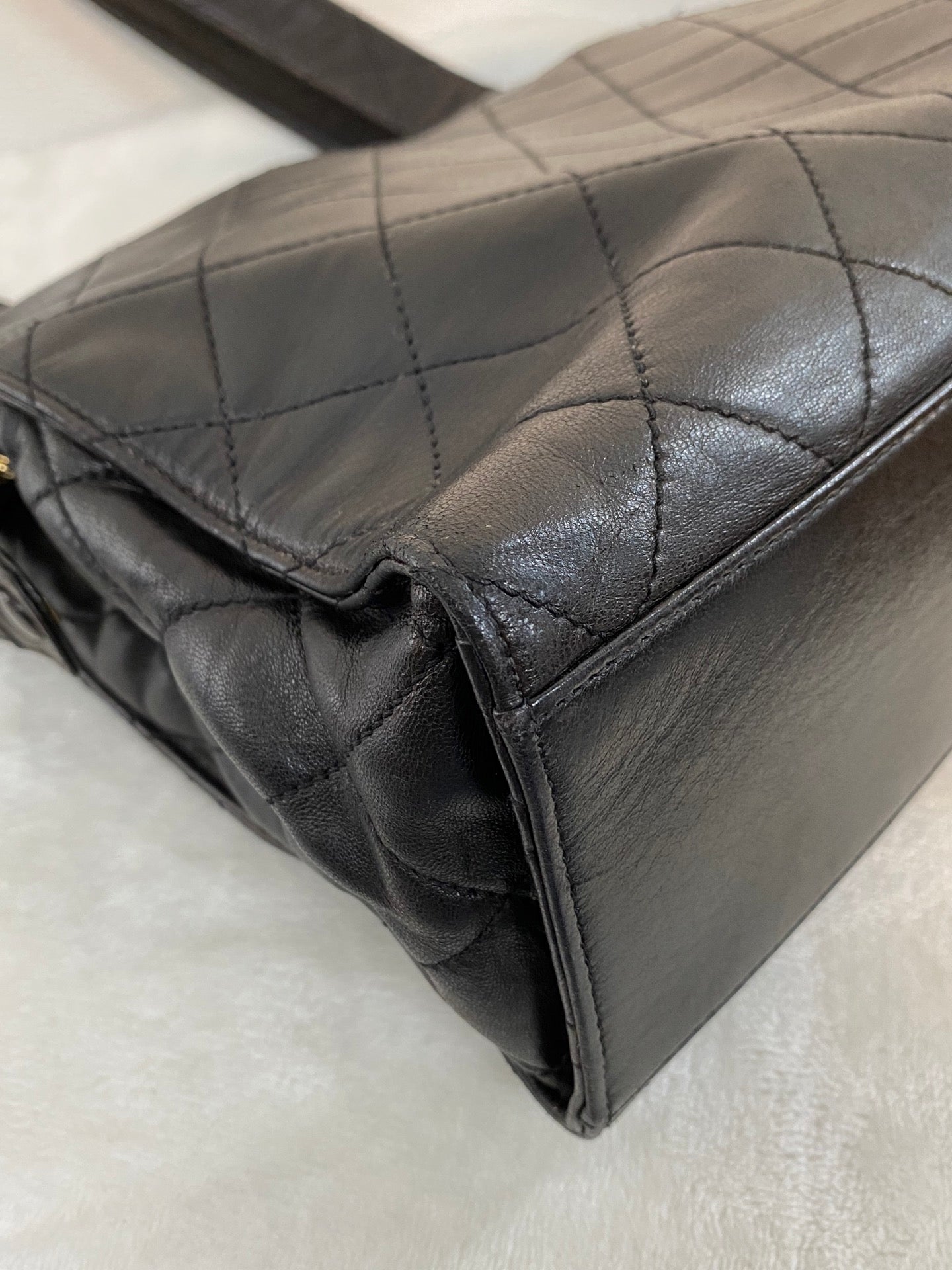 CHANEL Stitches Quilted Lambskin Handbag