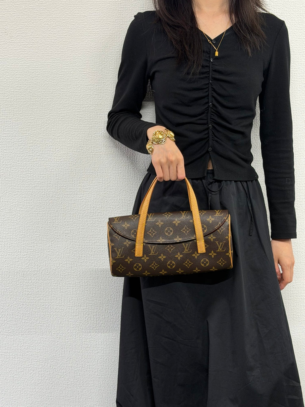 LOUIS VUITTON Sonatine Monogram Handbag