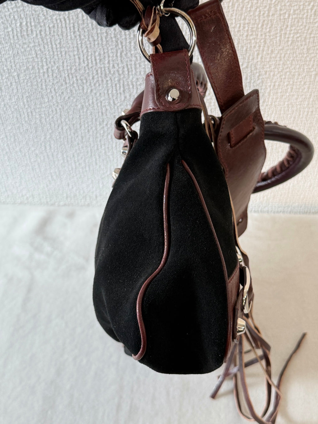 BALENCIAGA Le City studded leather-trimmed suede shoulder bag