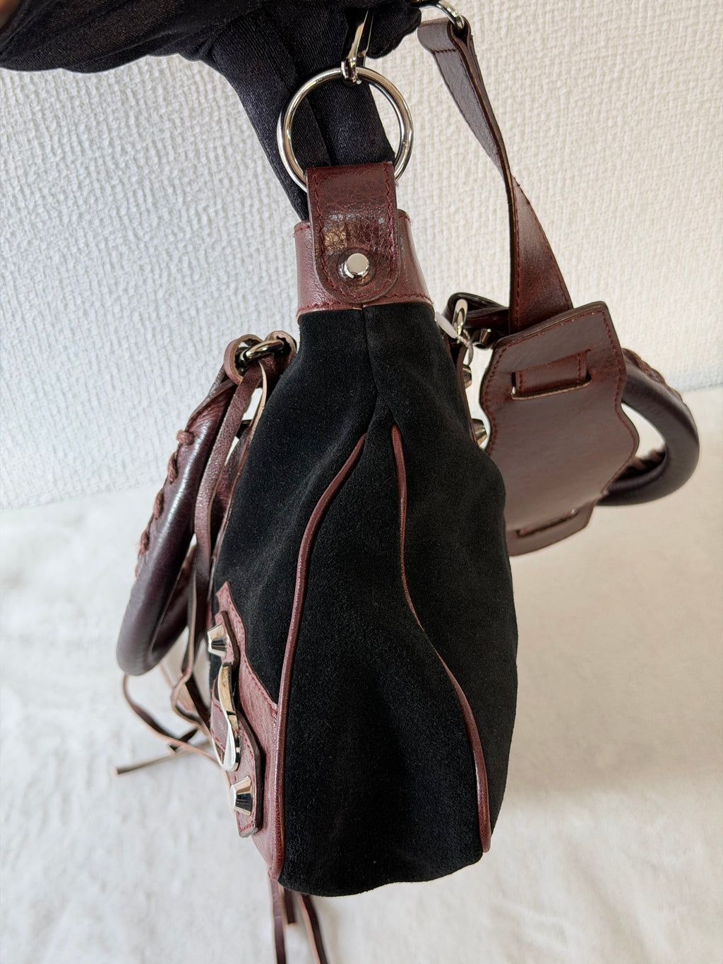 BALENCIAGA Le City studded leather-trimmed suede shoulder bag