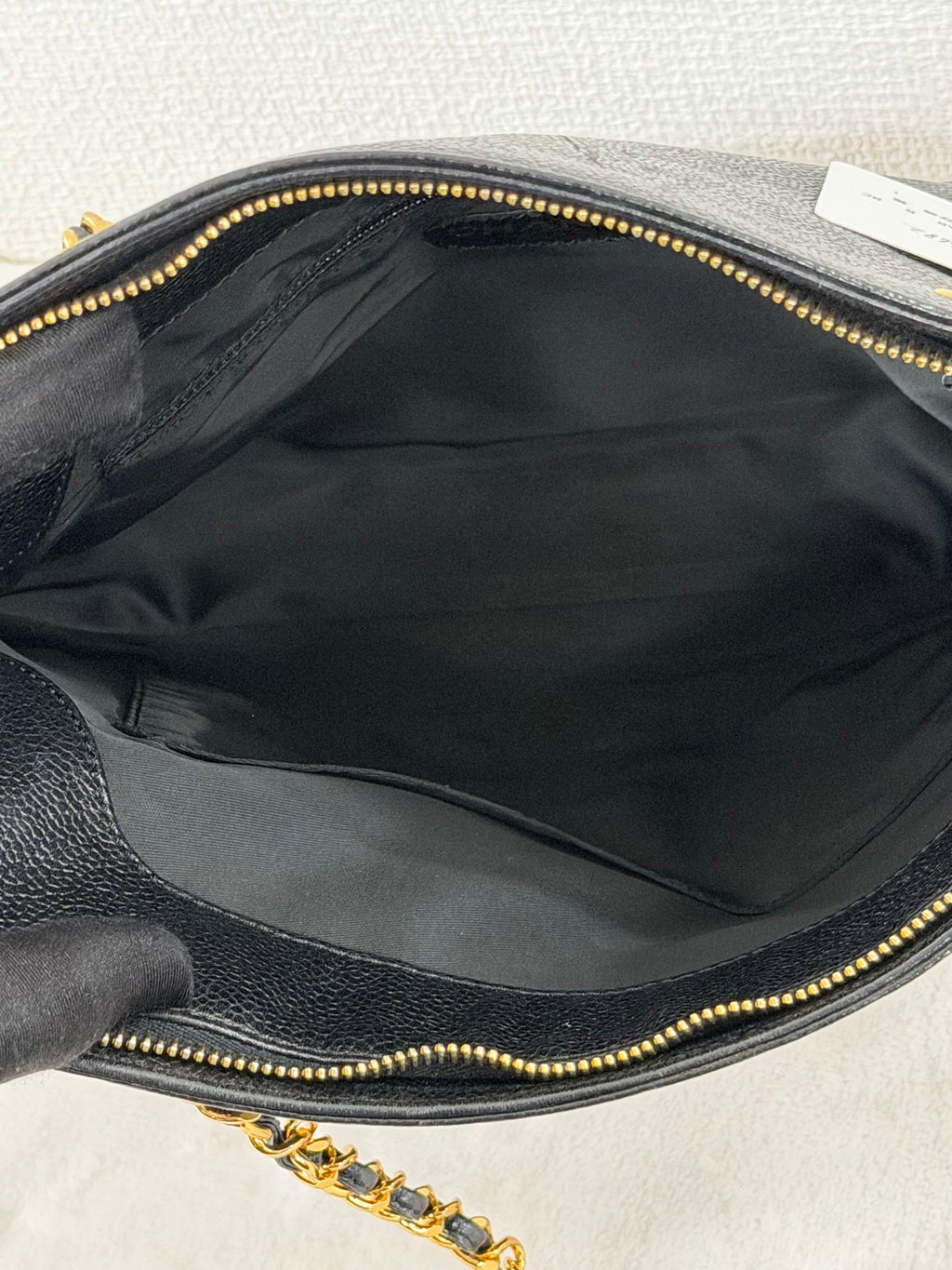 CHANEL Caviar Embossed Logo Chain Tote Bag