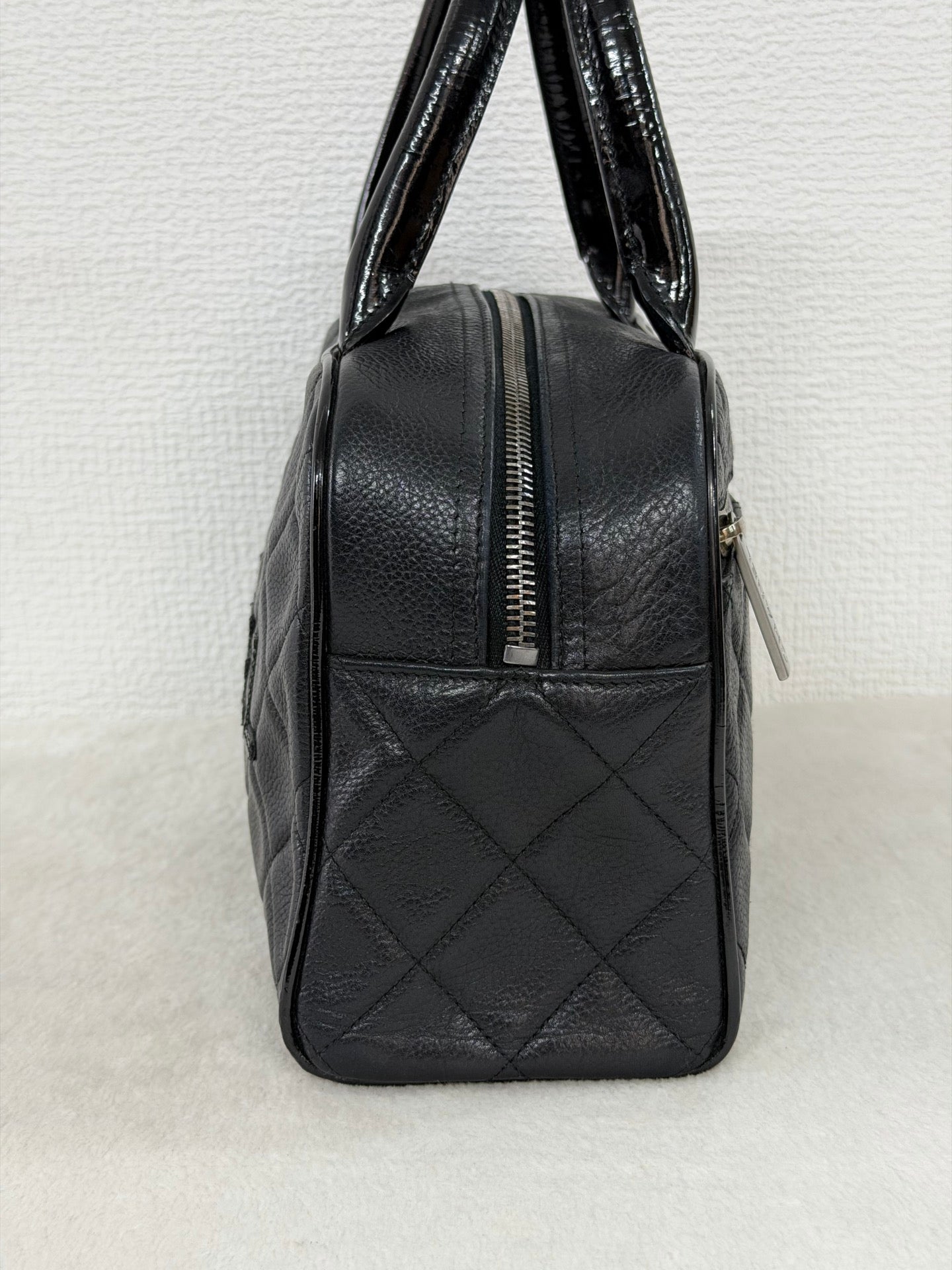 Chanel Caviar Quilted Logo Boston Bag