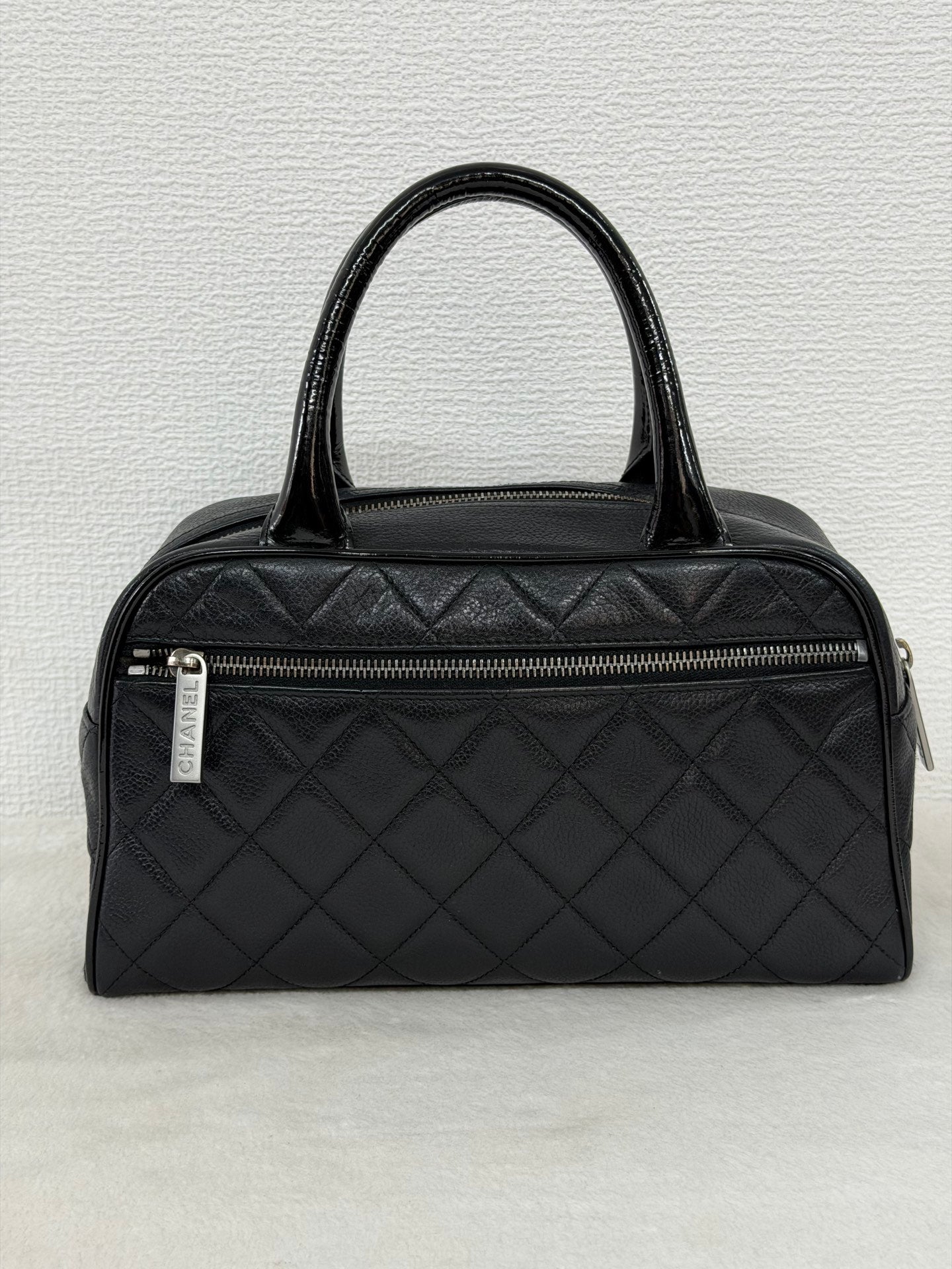 Chanel Caviar Quilted Logo Boston Bag