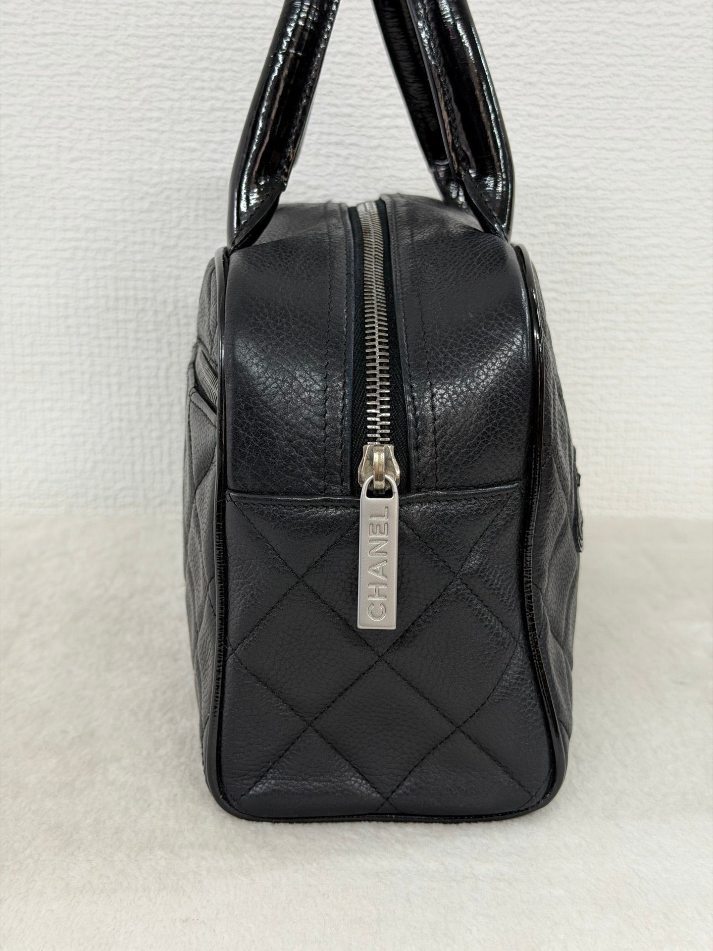 Chanel Caviar Quilted Logo Boston Bag
