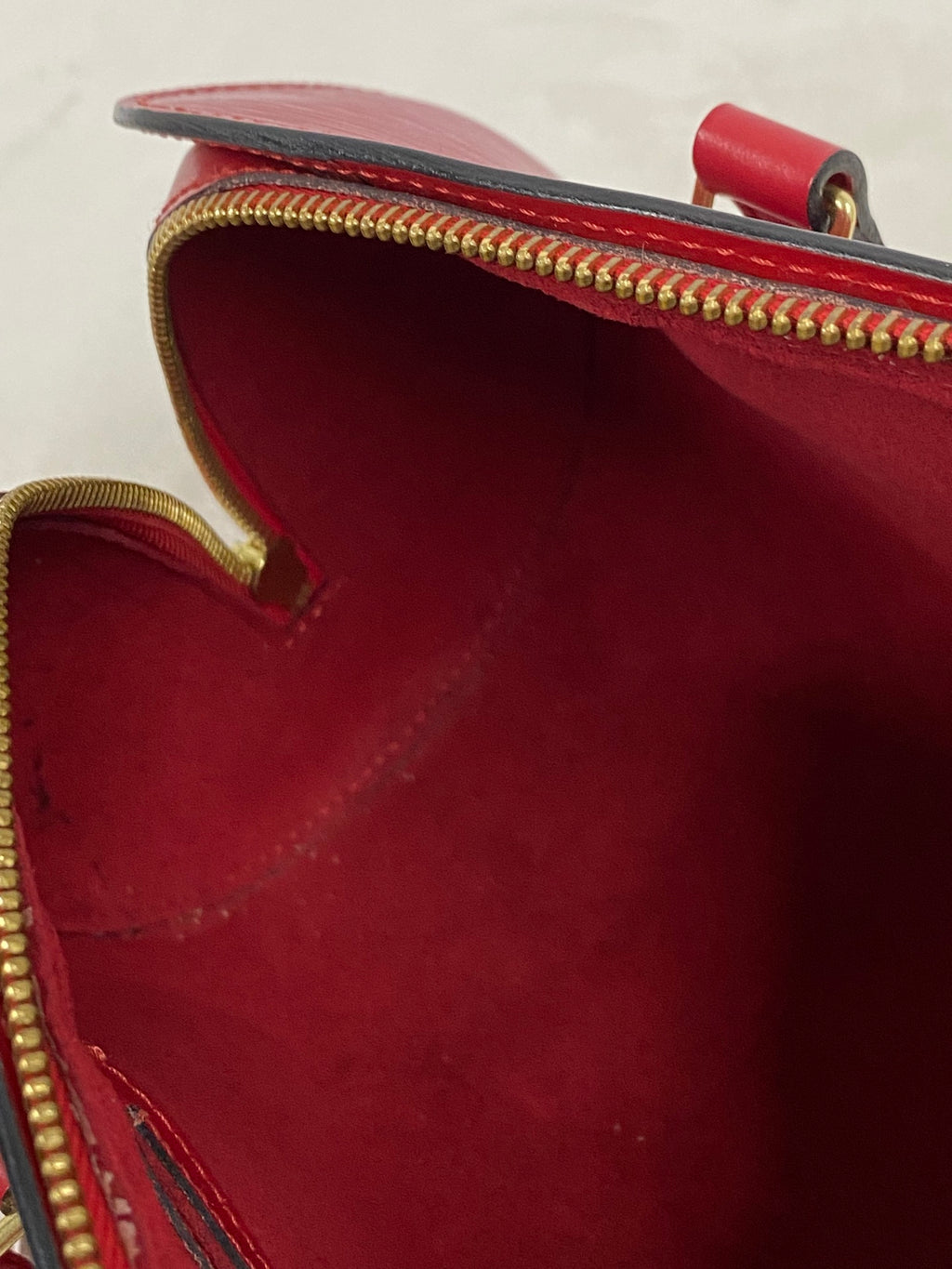 Louis Vuitton Soufflot Epi Handbag  Red Leather LV logo Engraved