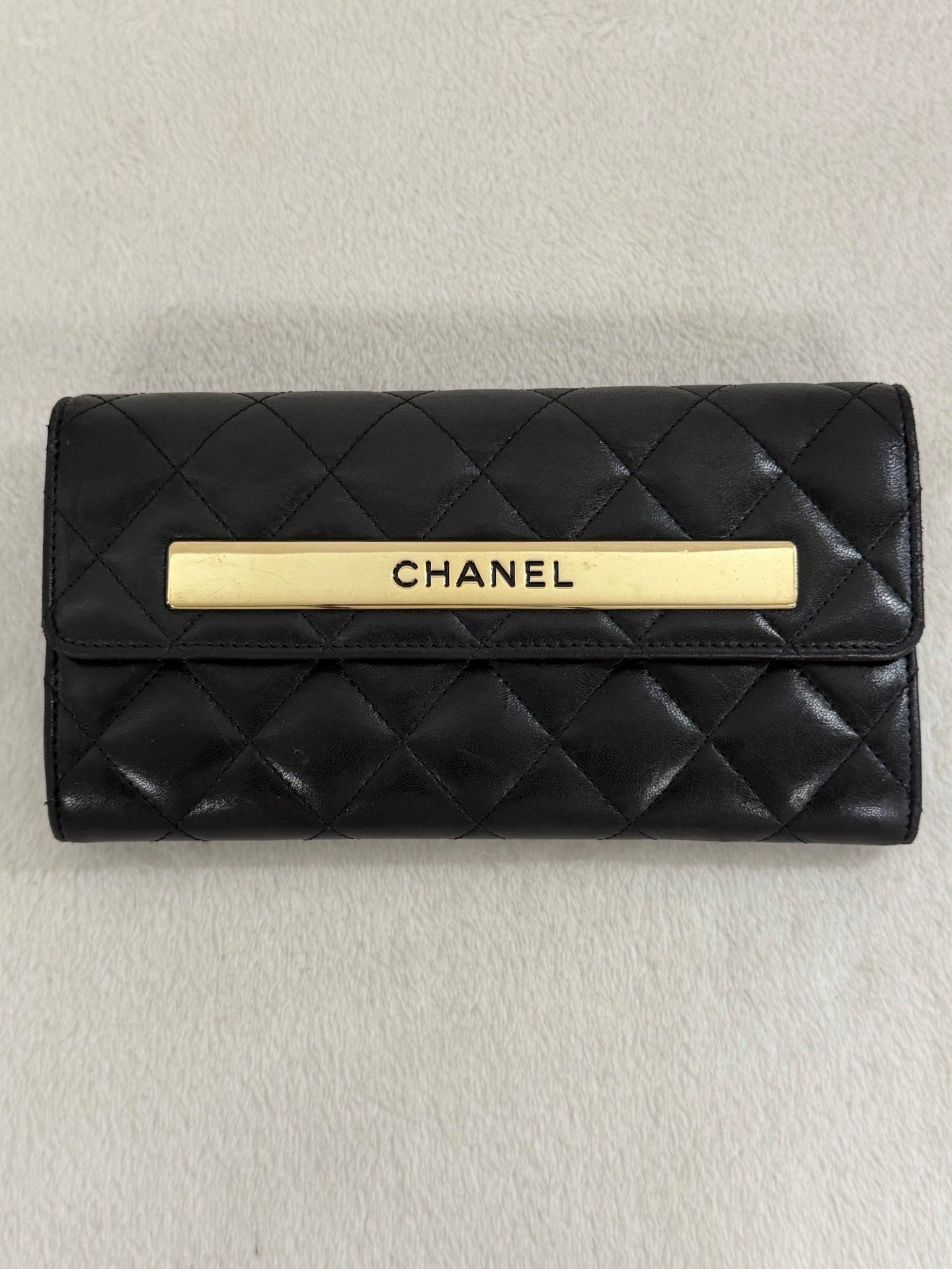 CHANEL Quilted Bifold Leather Wallet