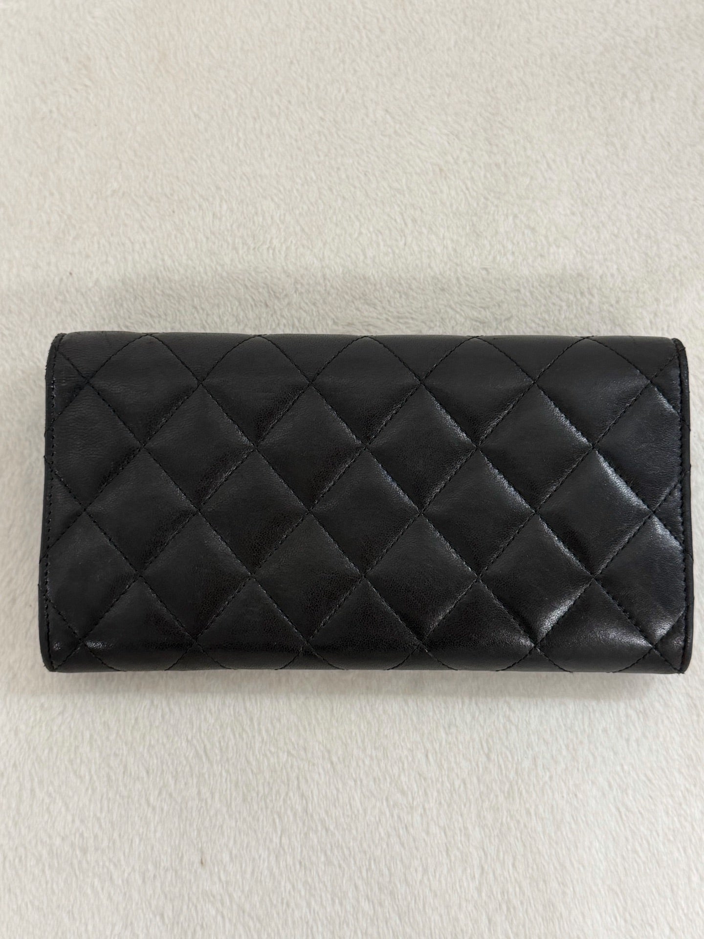 CHANEL Quilted Bifold Leather Wallet