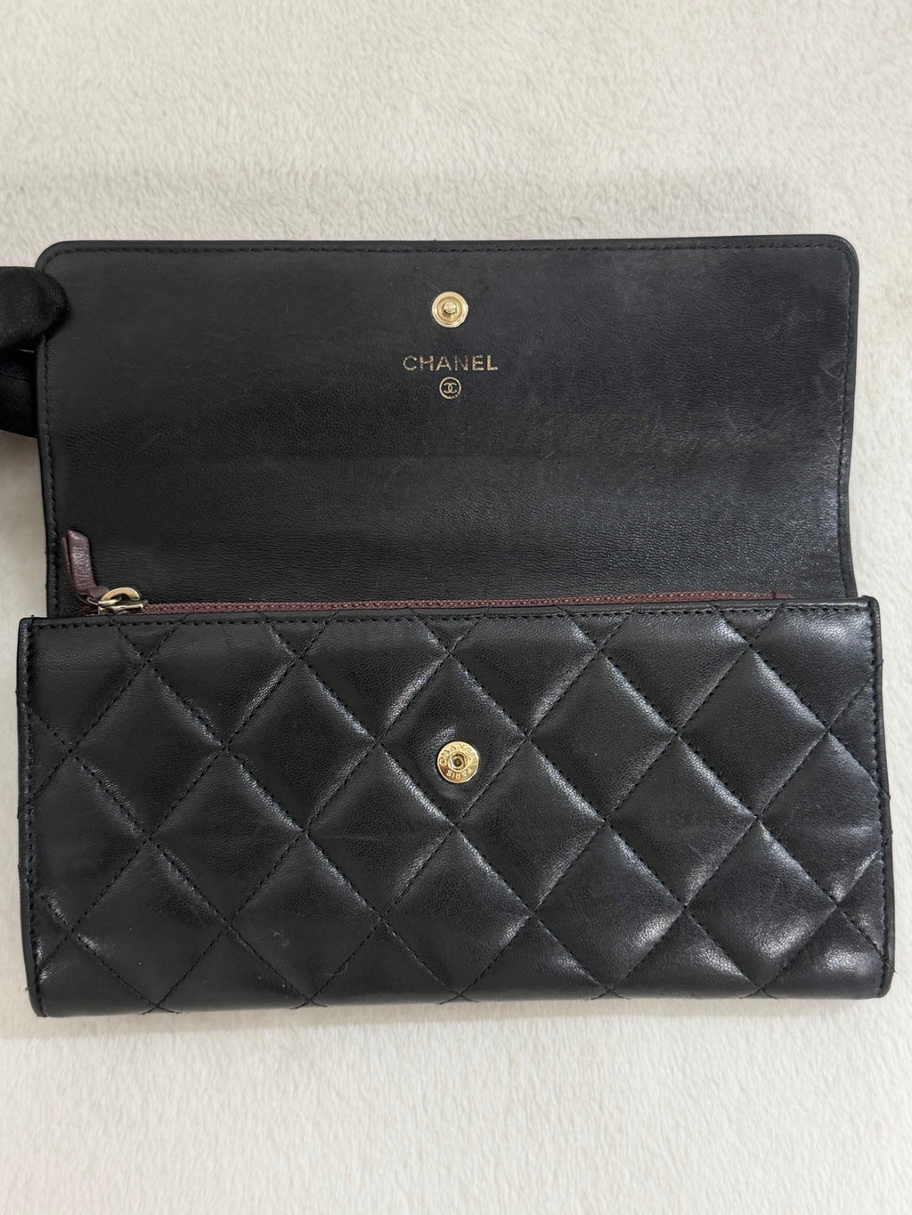 CHANEL Quilted Bifold Leather Wallet
