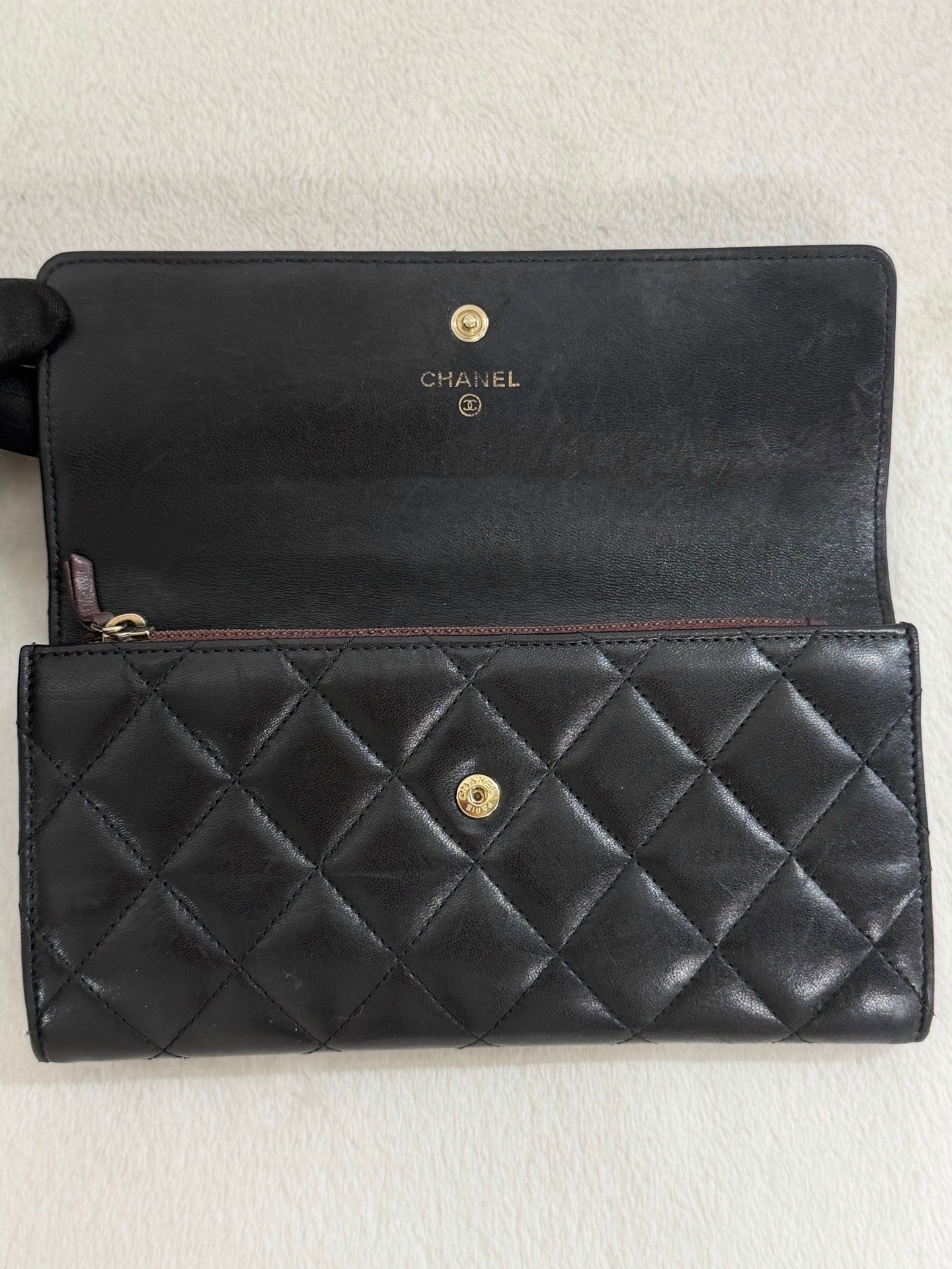 CHANEL Quilted Bifold Leather Wallet