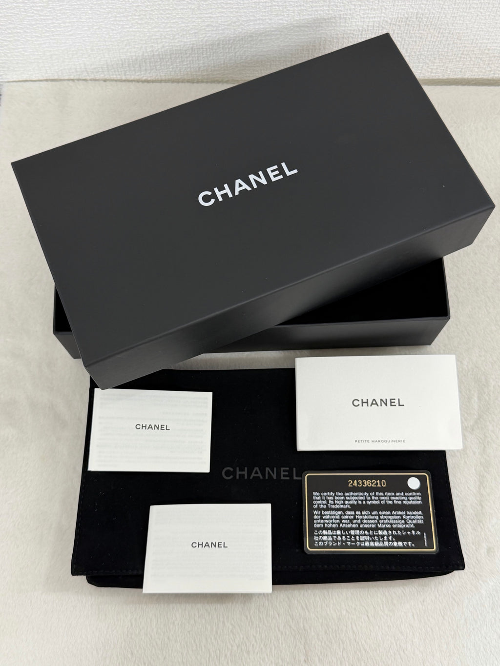CHANEL Quilted Bifold Leather Wallet