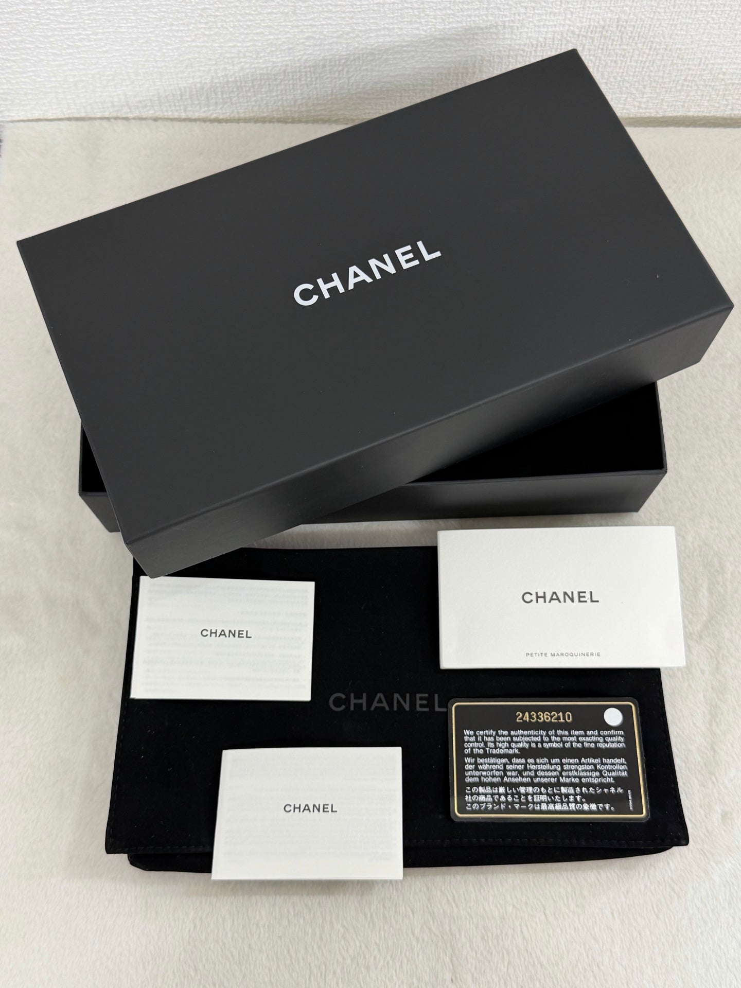 CHANEL Quilted Bifold Leather Wallet