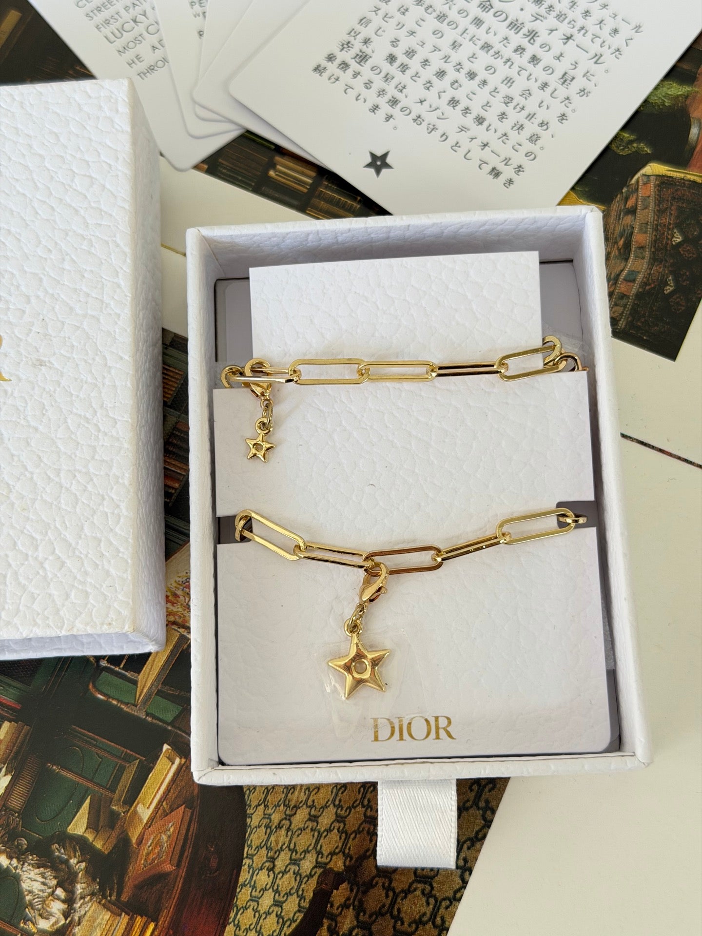 Dior Beauty Gold Phone Charm Stars and Logo Chain