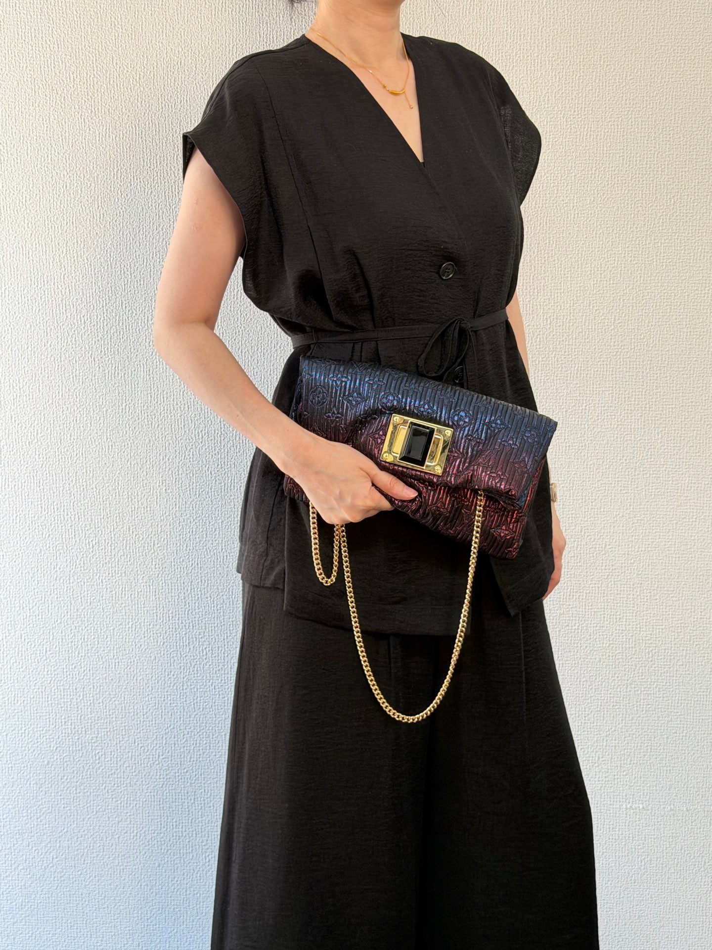 Louis Vuitton Pochette Altaïr Clutch