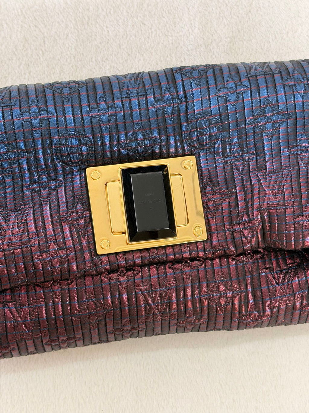 Louis Vuitton Pochette Altaïr Clutch
