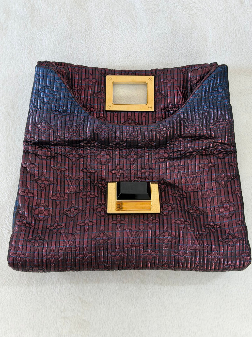 Louis Vuitton Pochette Altaïr Clutch