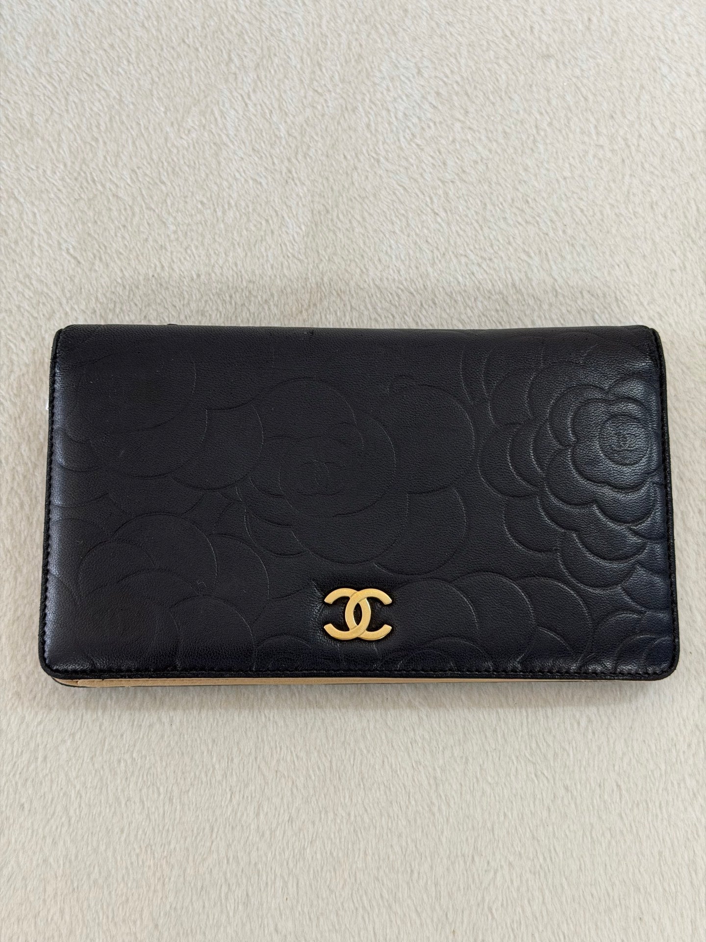 CHANEL Camellia Embossed Flap Wallet
