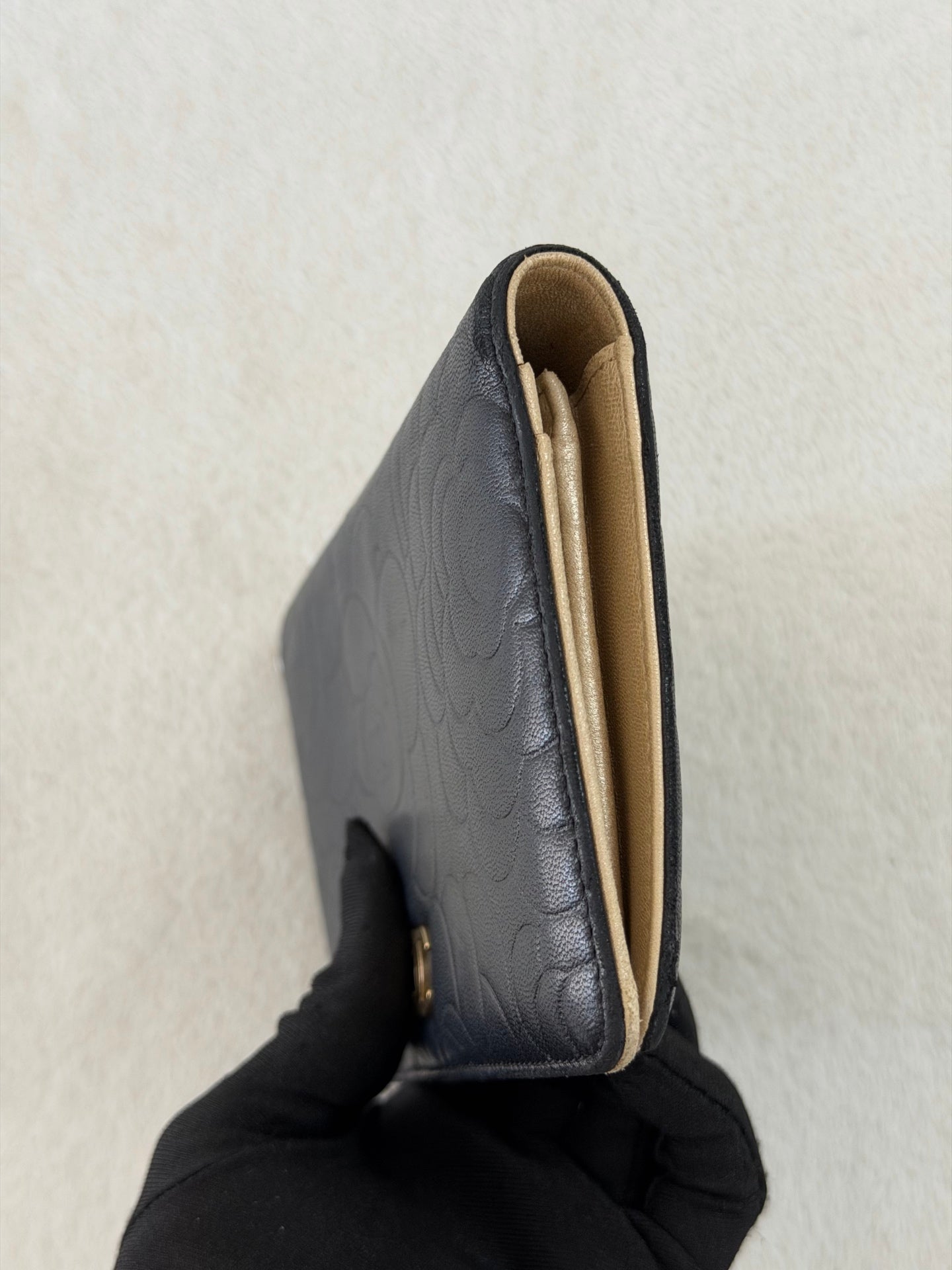 CHANEL Camellia Embossed Flap Wallet