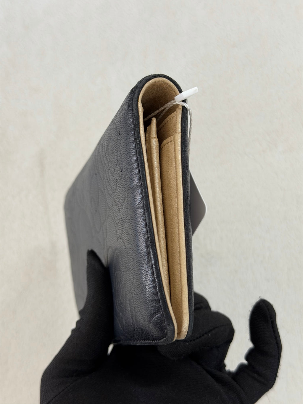 CHANEL Camellia Embossed Flap Wallet