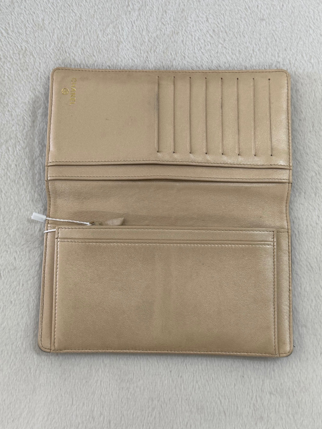CHANEL Camellia Embossed Flap Wallet