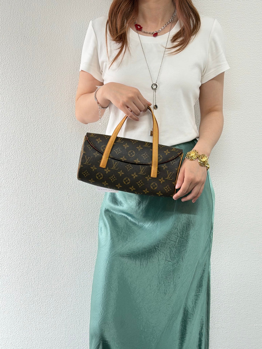 LOUIS VUITTON Sonatine Monogram Handbag