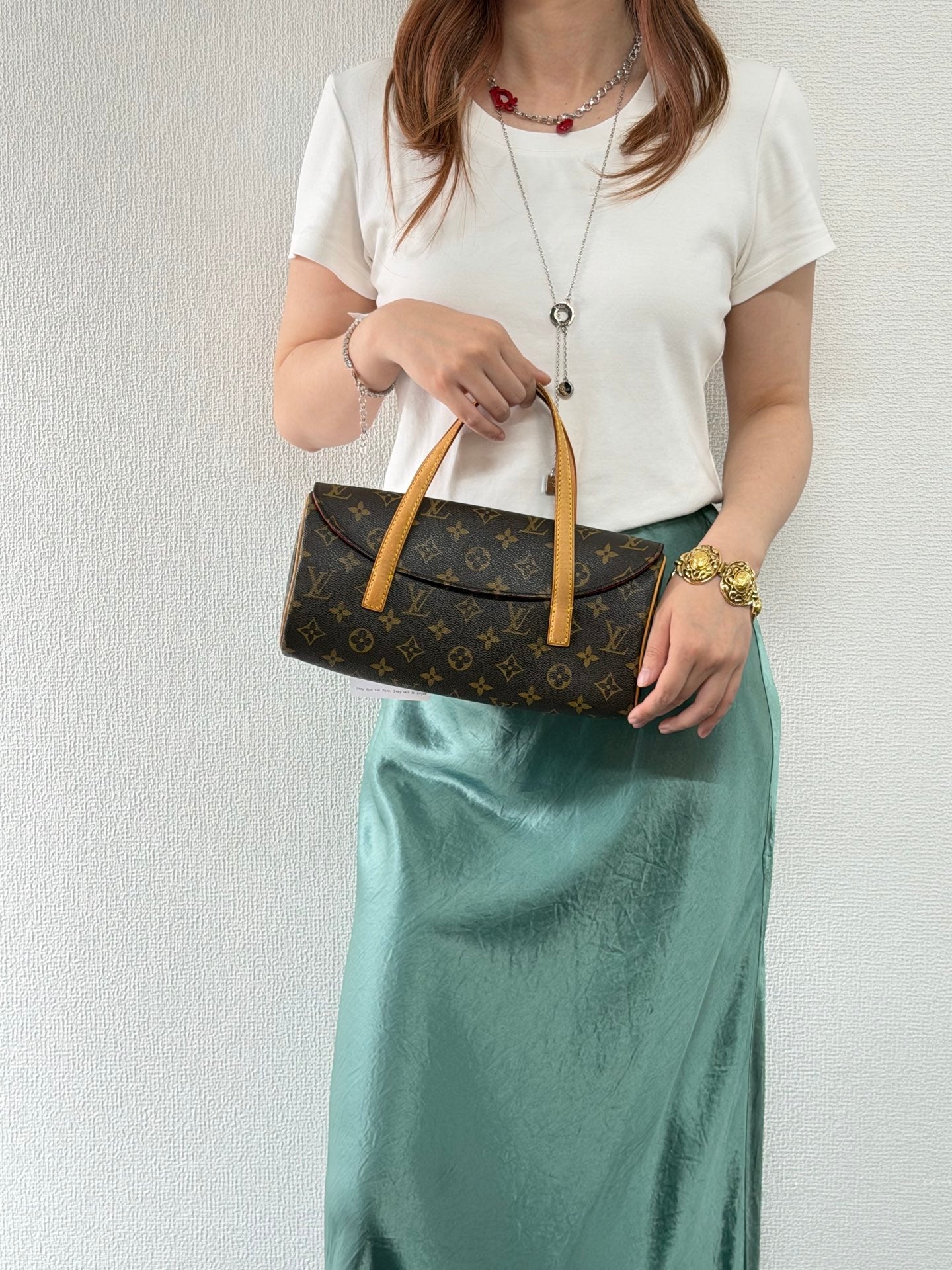 LOUIS VUITTON Sonatine Monogram Handbag
