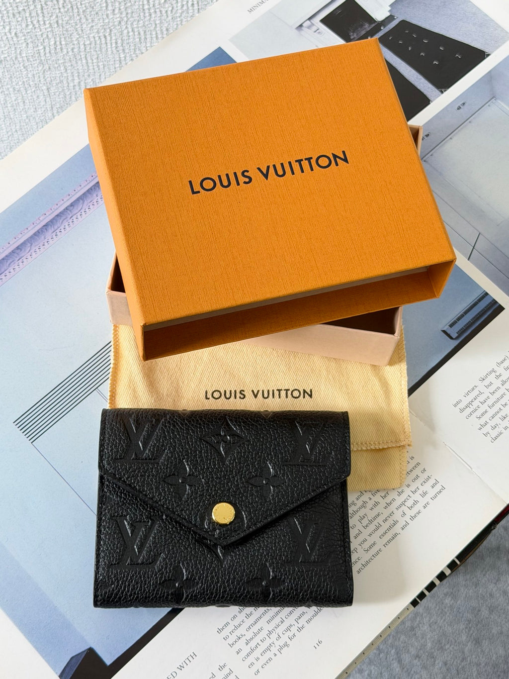 Louis Vuitton Zoe Monogram Leather Trifold Wallet