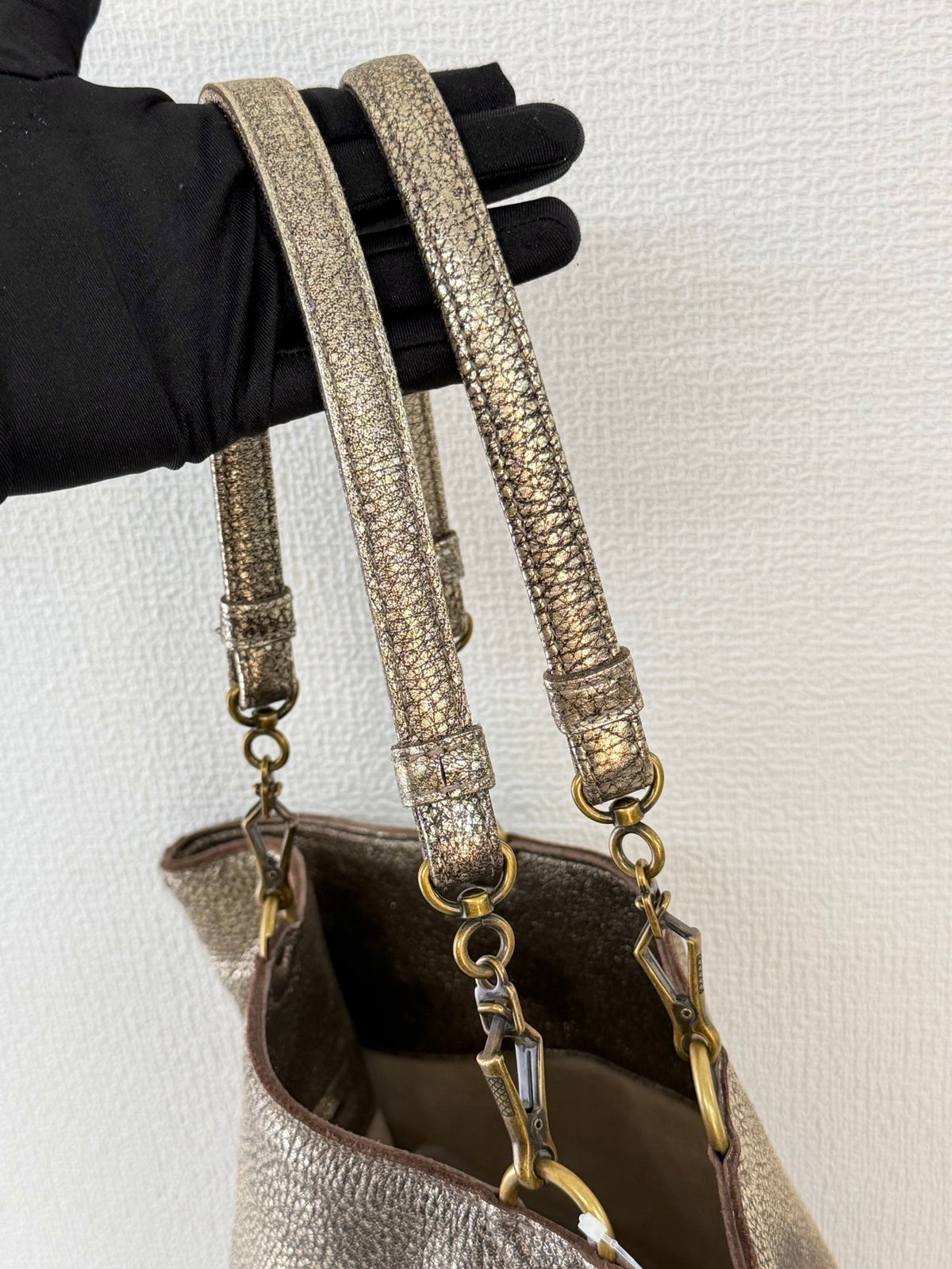 BOTTEGA VENETA Metallic Gold Intrecciato Spiral Trim Leather Bucket Tote Bag