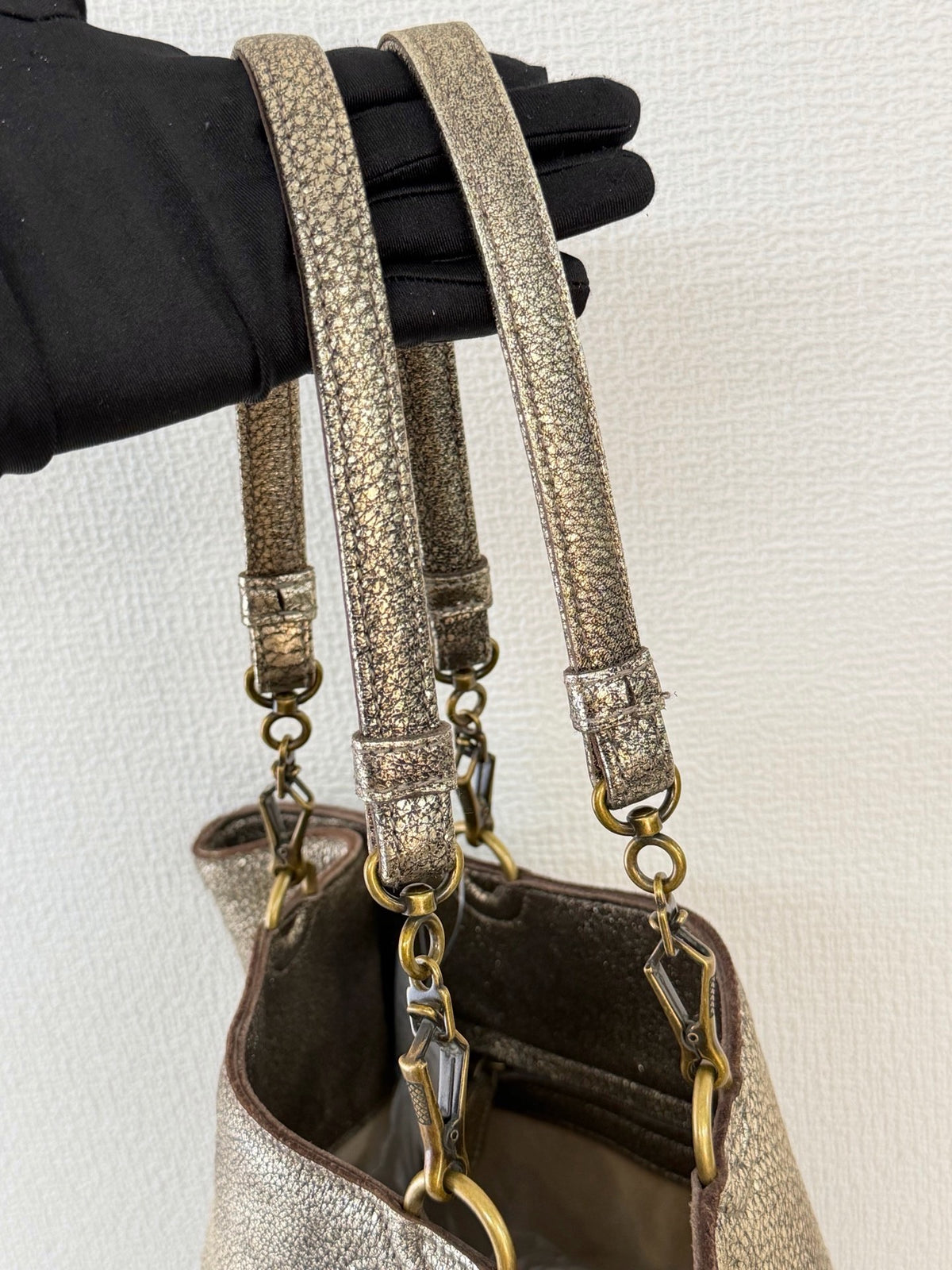 BOTTEGA VENETA Metallic Gold Intrecciato Spiral Trim Leather Bucket Tote Bag