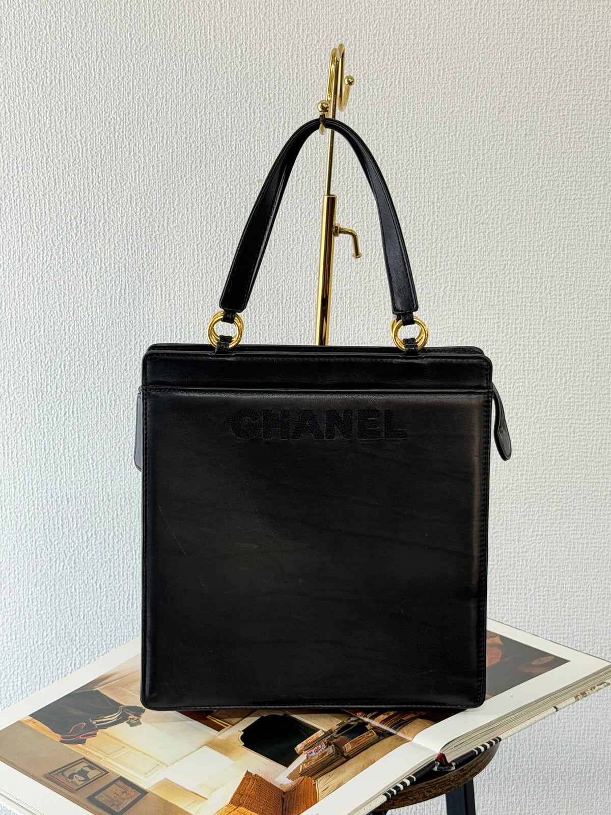 CHANEL Black Leather Square Tote Bag with Embossed Logo