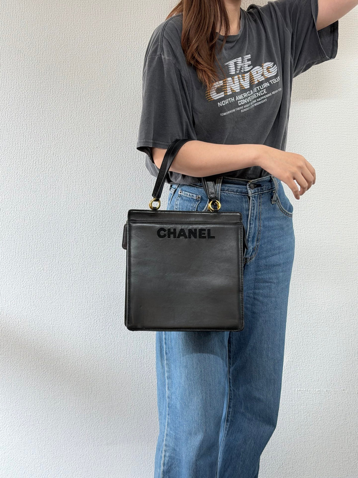 CHANEL Black Leather Square Tote Bag with Embossed Logo