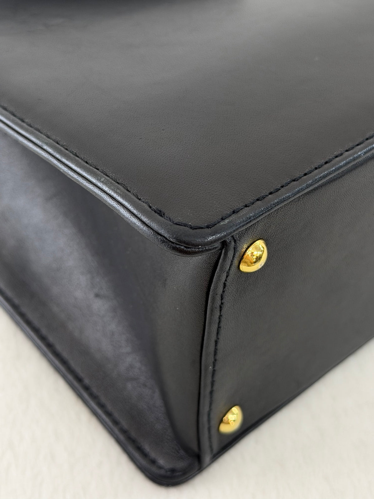 CHANEL Black Leather Square Tote Bag with Embossed Logo