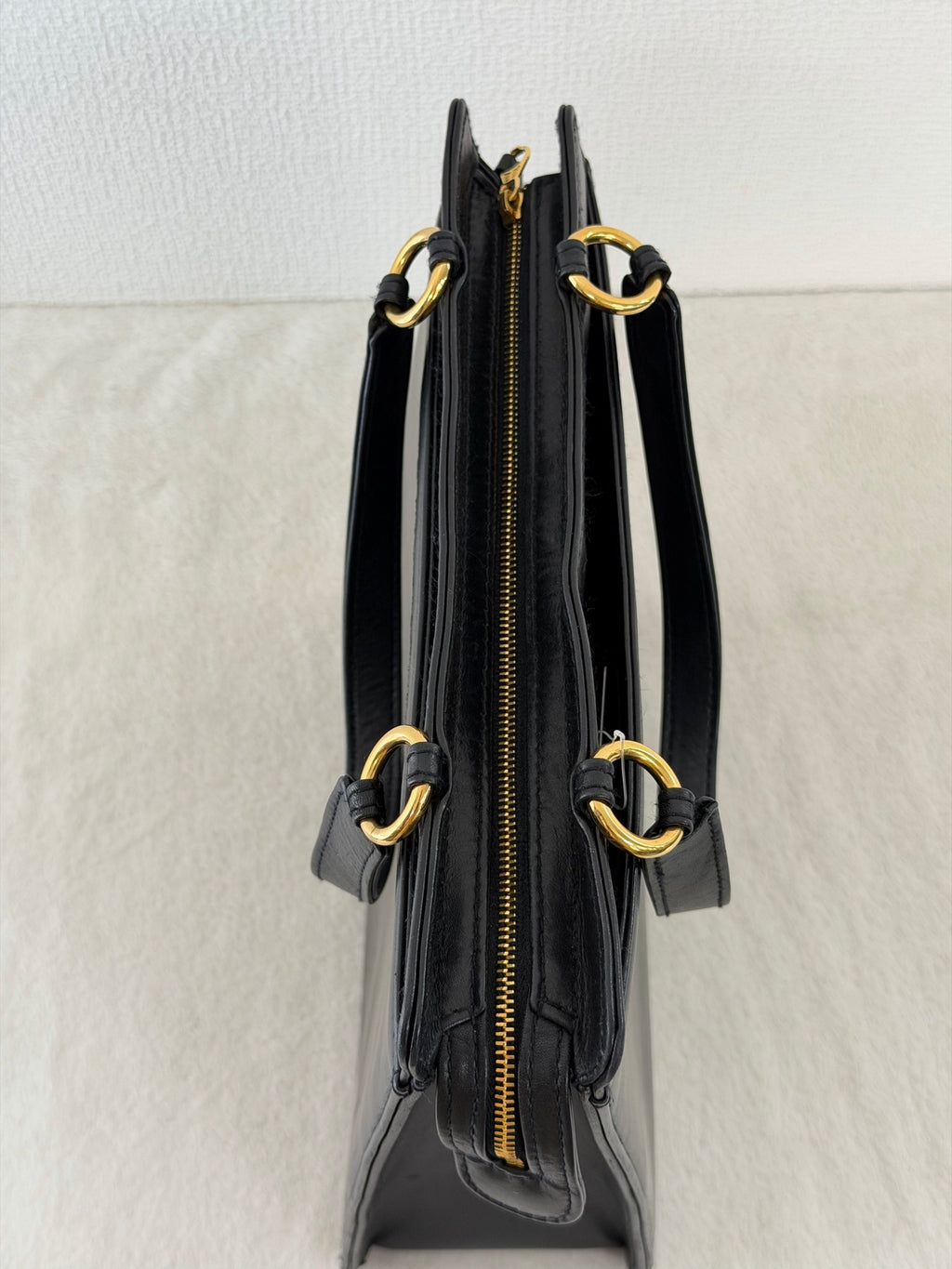 CHANEL Black Leather Square Tote Bag with Embossed Logo
