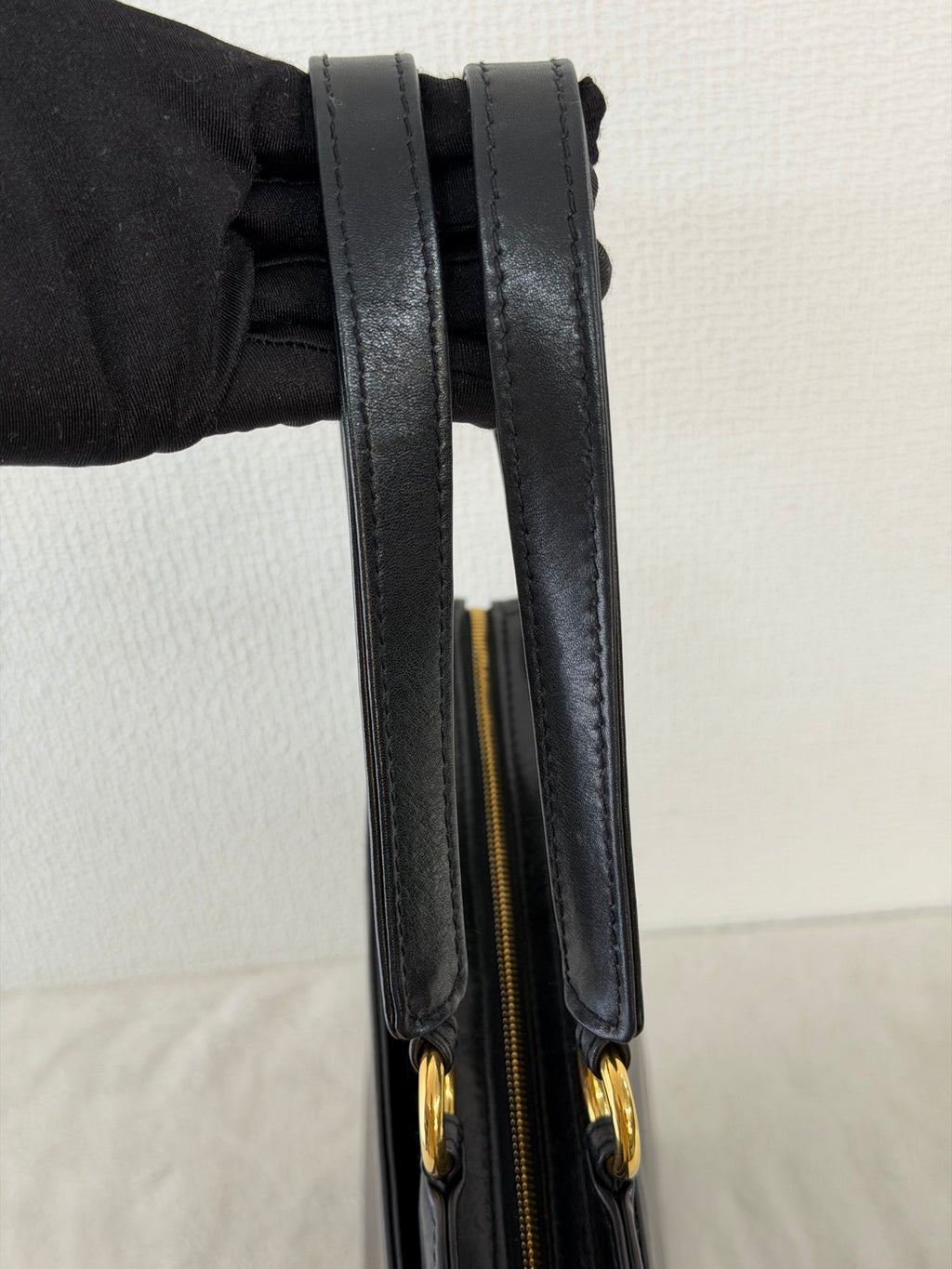 CHANEL Black Leather Square Tote Bag with Embossed Logo