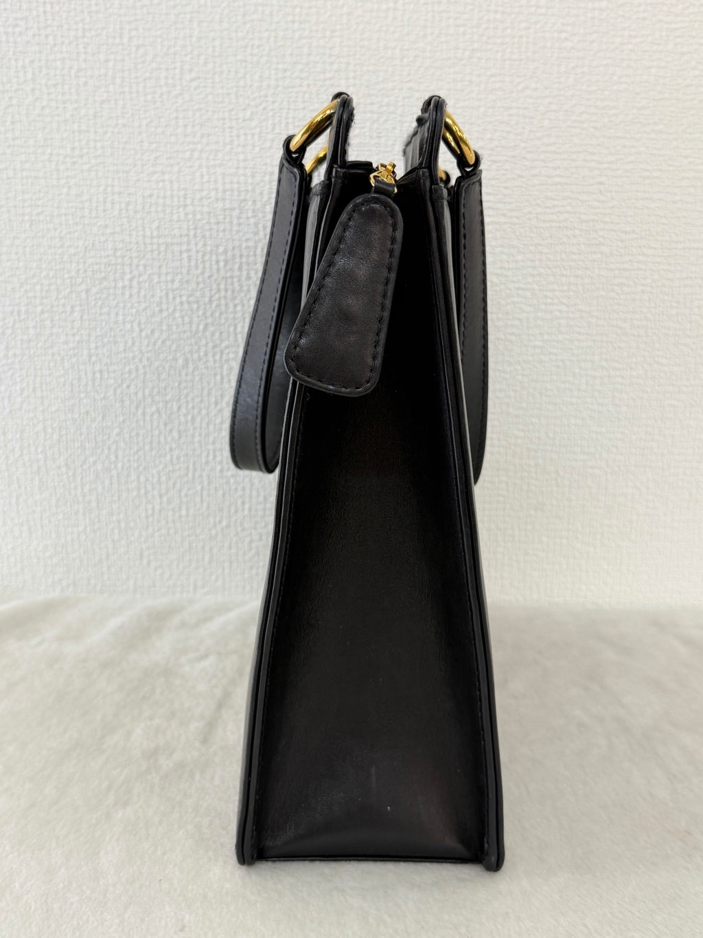 CHANEL Black Leather Square Tote Bag with Embossed Logo