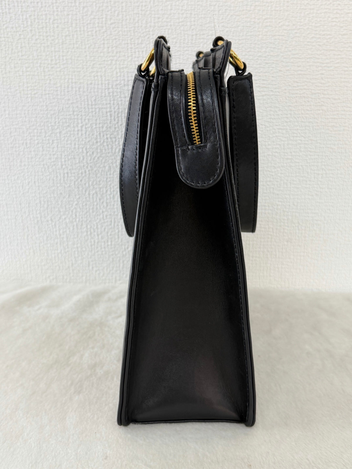 CHANEL Black Leather Square Tote Bag with Embossed Logo