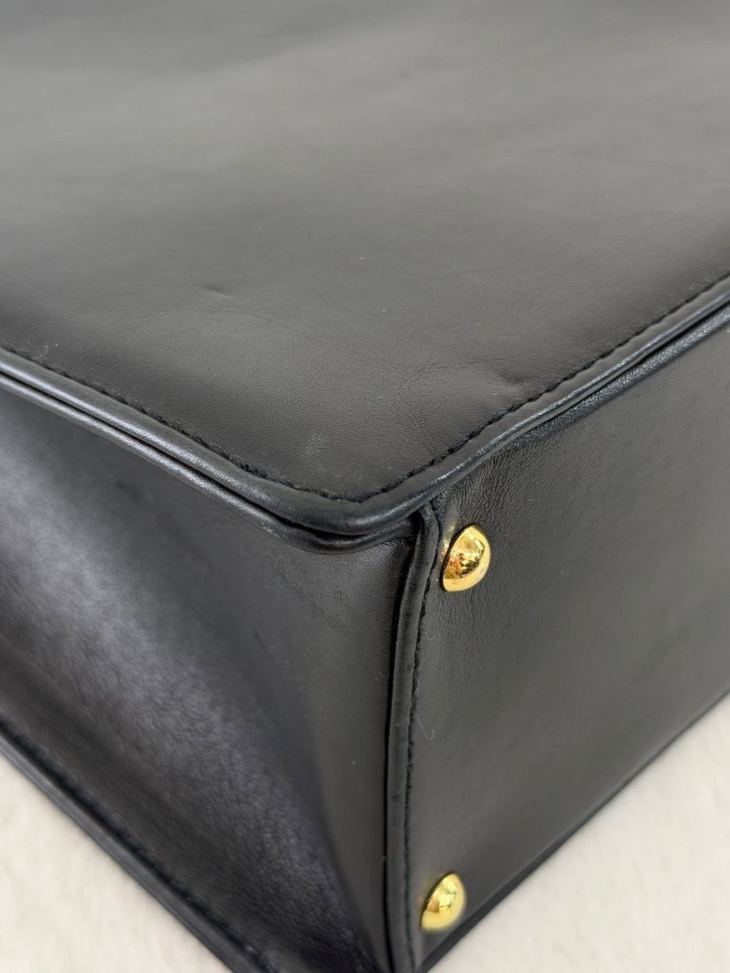 CHANEL Black Leather Square Tote Bag with Embossed Logo