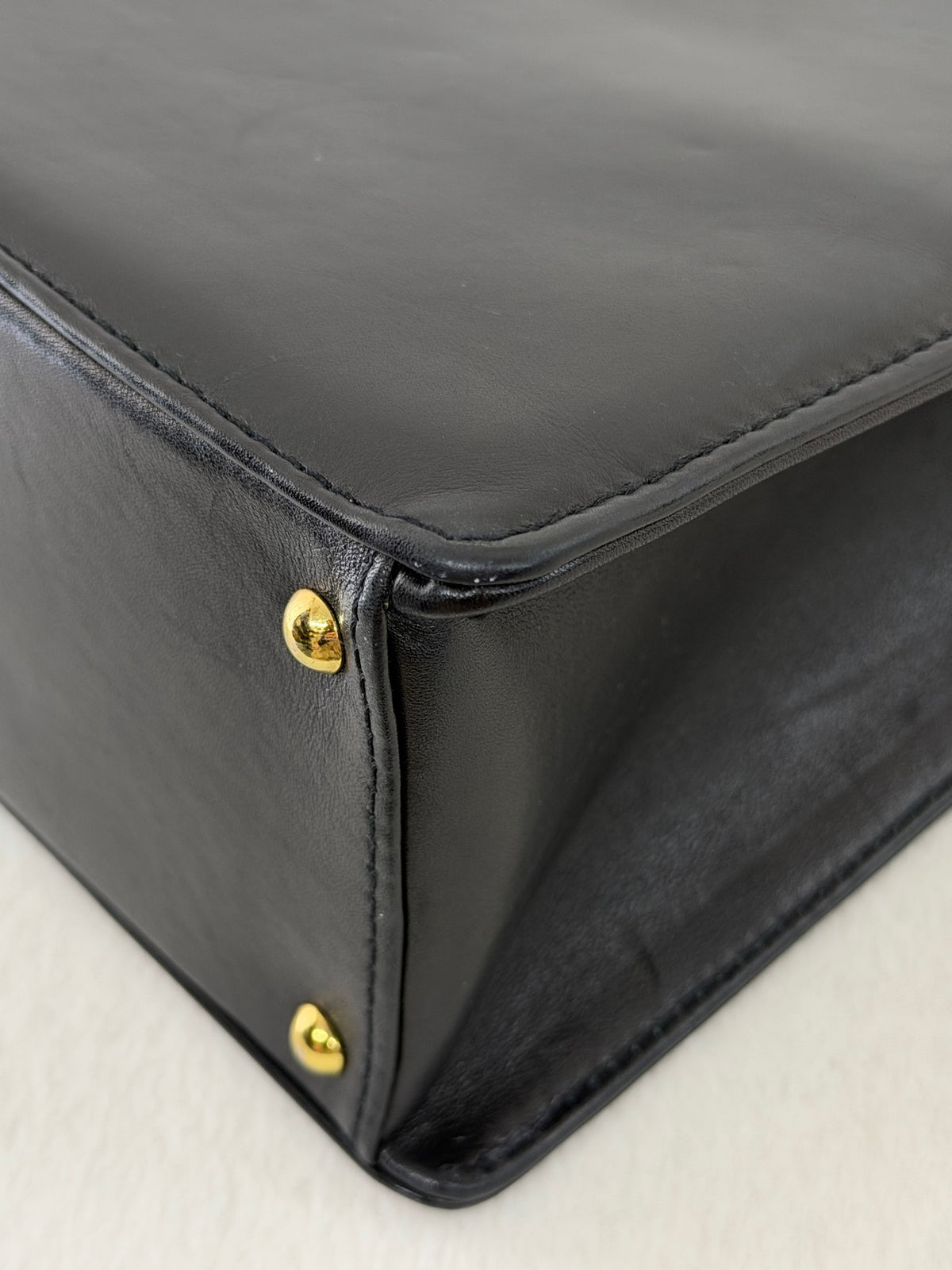 CHANEL Black Leather Square Tote Bag with Embossed Logo
