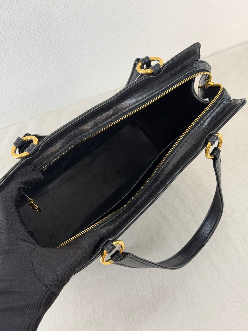 CHANEL Black Leather Square Tote Bag with Embossed Logo