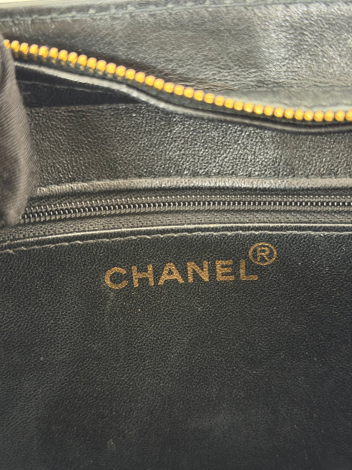 CHANEL Black Leather Square Tote Bag with Embossed Logo