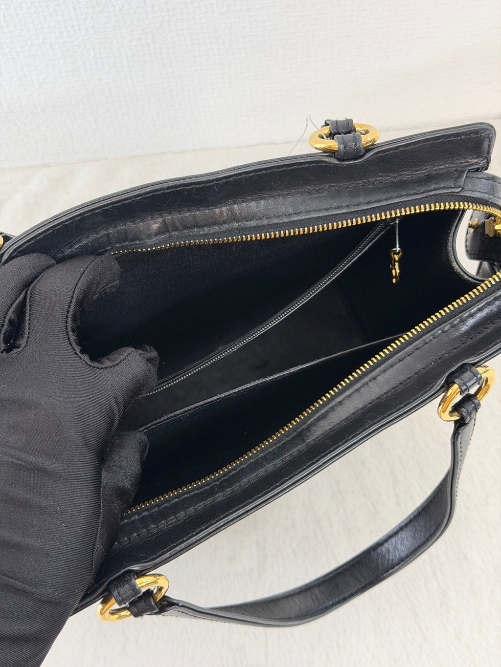 CHANEL Black Leather Square Tote Bag with Embossed Logo